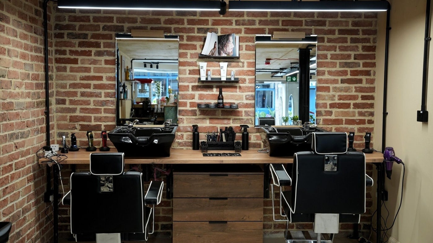 Morresi wash stations against a brick wall